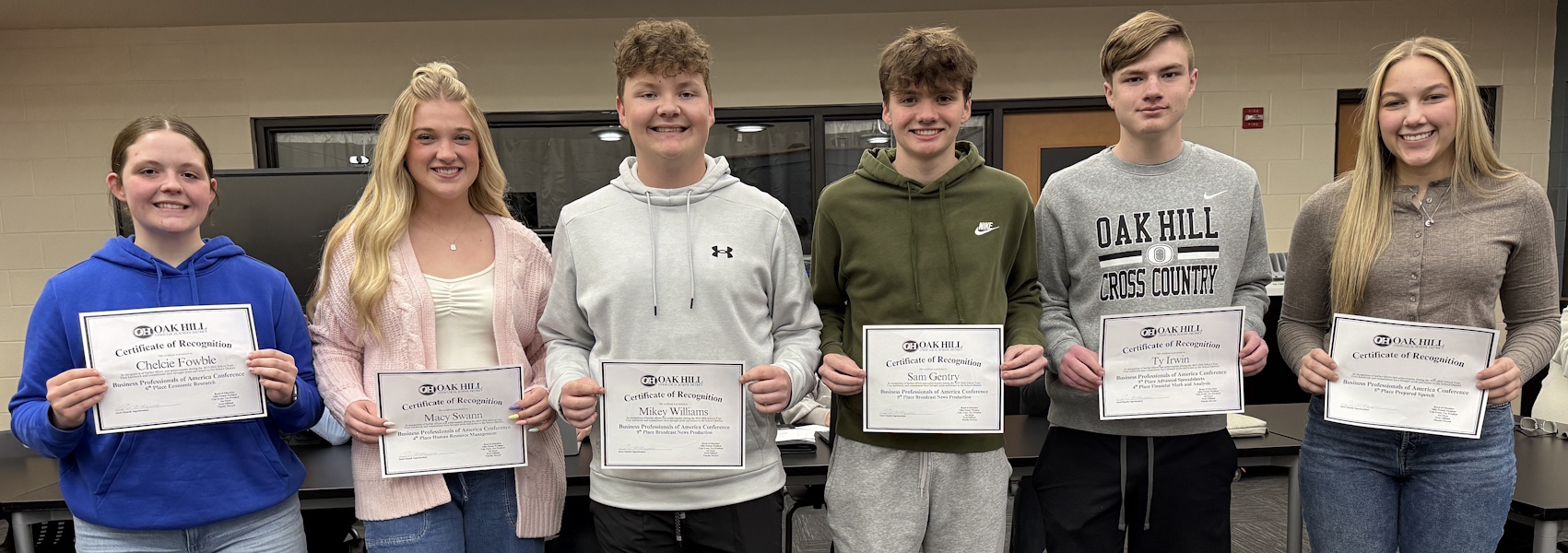 Photo of Chelcie Fowble, Macy Swann, Mikey Williams, Sam Gentry, Ty Irwin, and Emma Figgins with their certificates.