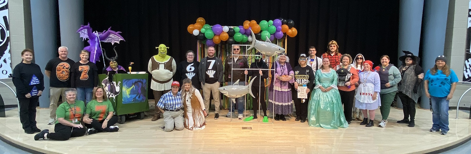 Group Photo of the Middle/High School staff in Halloween outfits